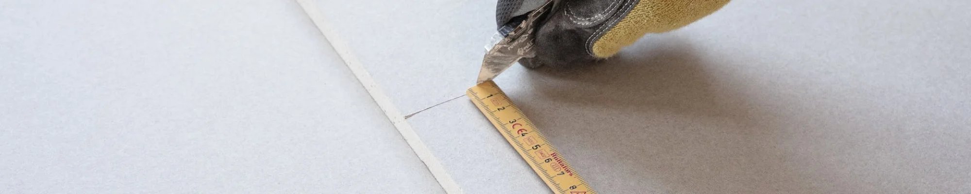 skilled professional measuring tile